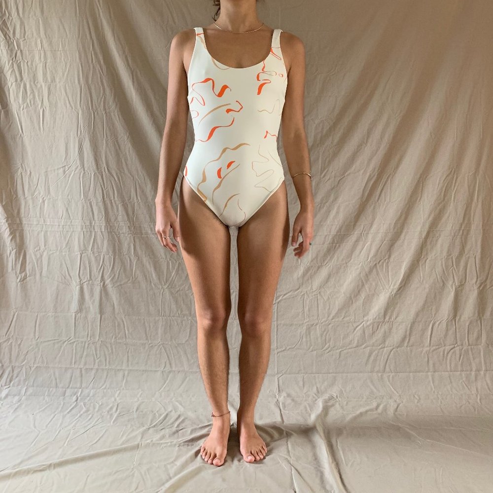 One Piece, beige with orange accent detailing